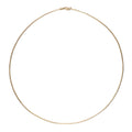 Classic Omega necklace in front of a white background