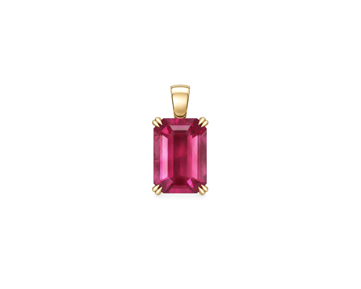 A rectangular emerald-cut pink gemstone pendant in a gold four-prong setting with a gold bail, centered on a plain white background.
